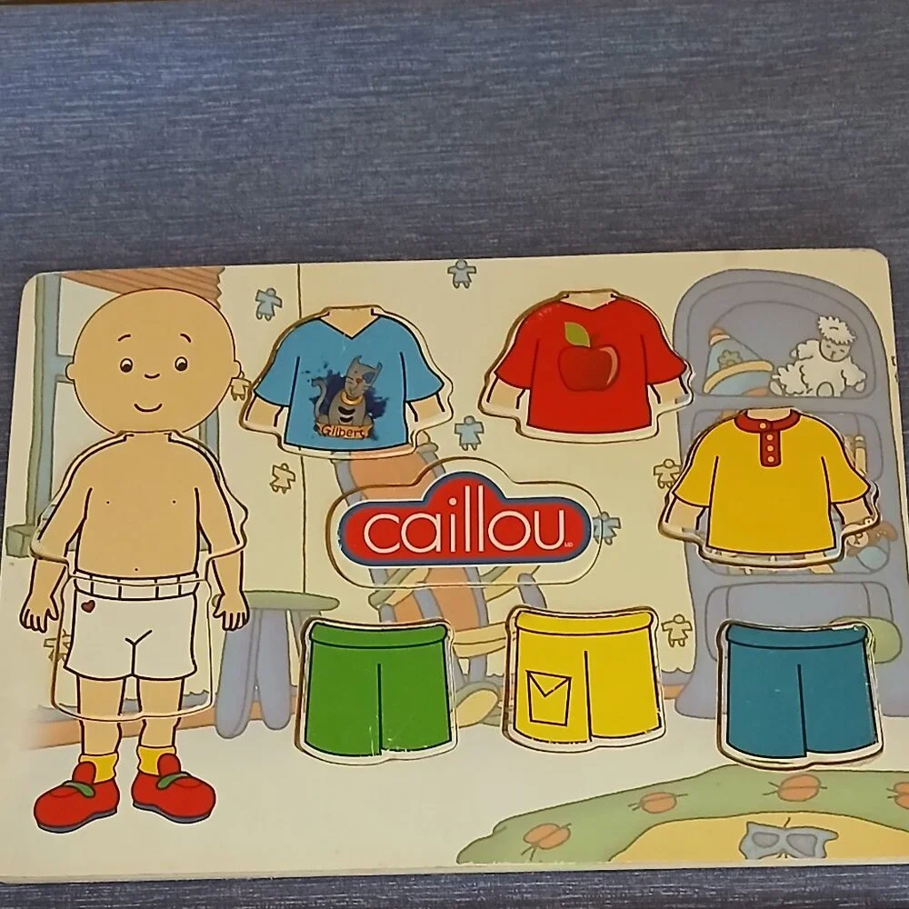 Wooden puzzle Caillou : Dress up + Pique -nique used